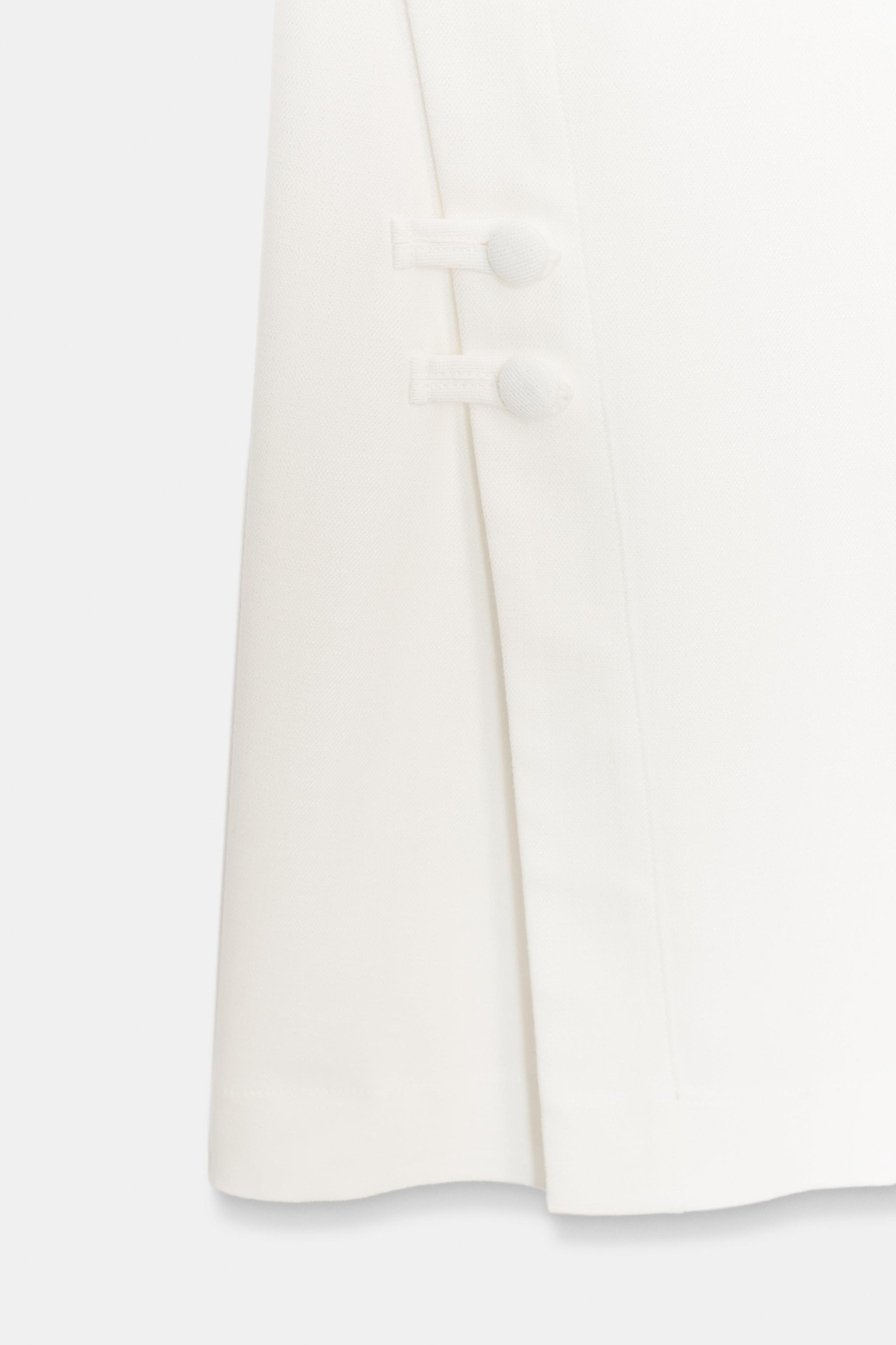 PANTS WITH SLIT HEMS